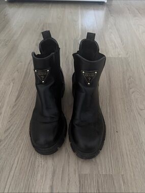 Guess Black Chelsea Boots with Gold Triangle Logo